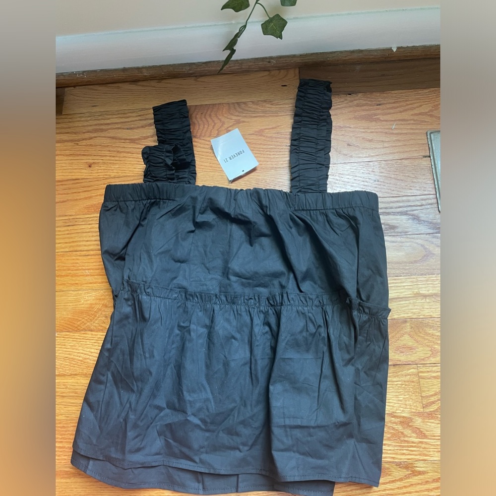 flowy black tank top from forever 21 never worn with tag size S